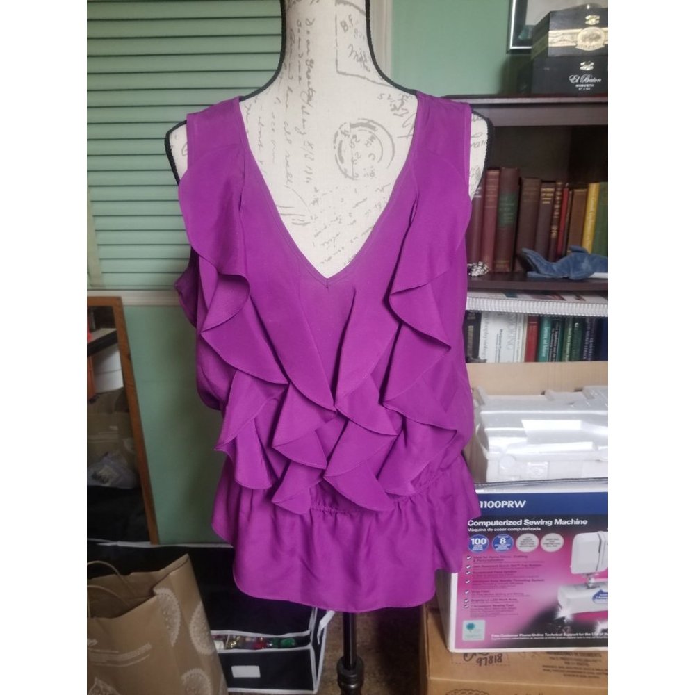 Purple peplum sleeveless decorative blouse